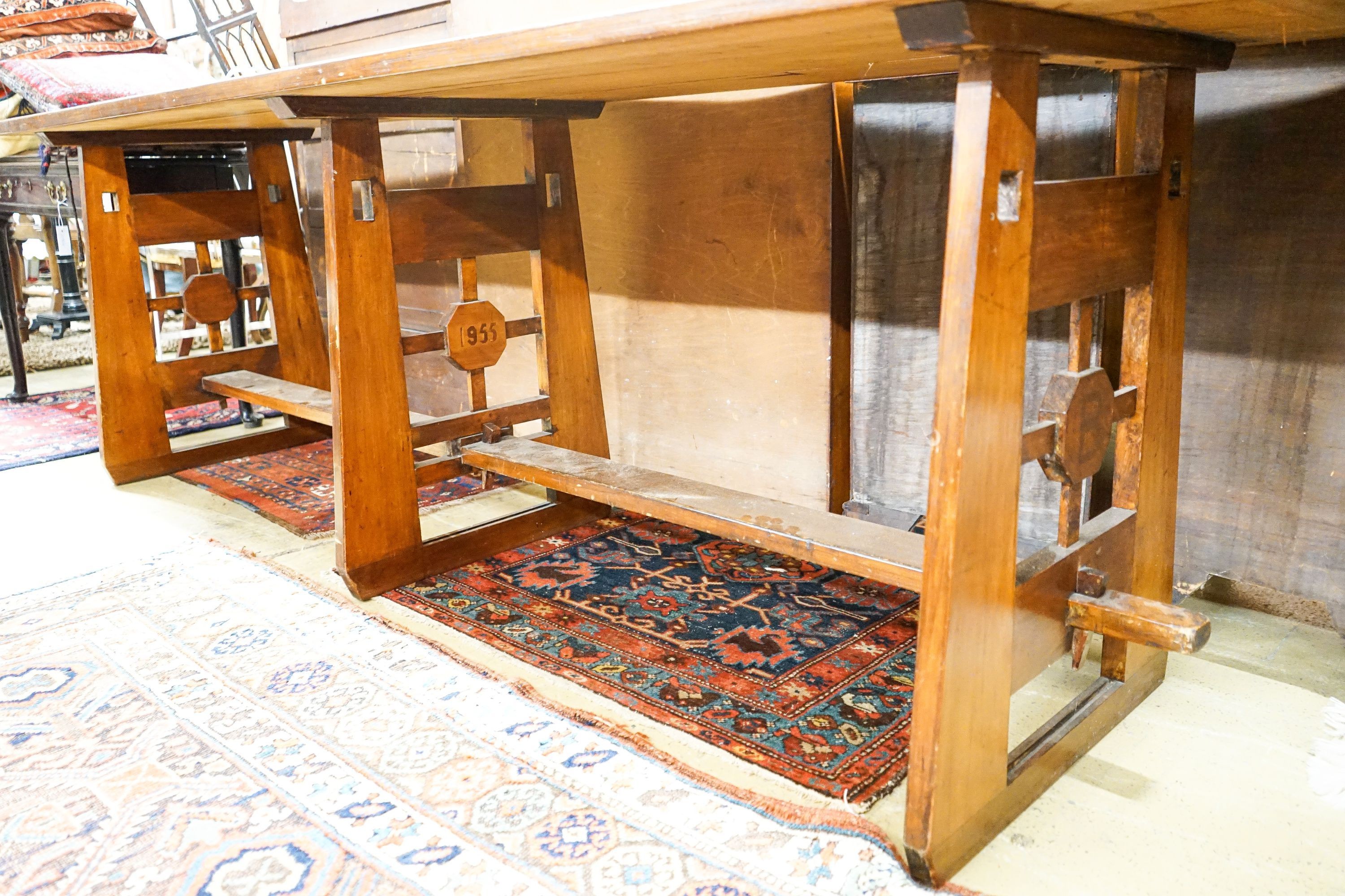 A mid 20th century Arts and Crafts style rectangular pine and beech serving table, dated 1955, length 245cm, depth 66cm, height 76cm